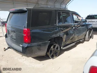 2019 Chevrolet Tahoe LT with VIN 1GNSCBKC0KR328639, listed as a IAAI auction lot 41740284 with 111,734 mi miles. Bid and sale history available at carsss.com. Image 4.