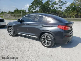 2017 BMW X4 xDrive28i with VIN 5UXXW3C36H0T79956, listed as a Copart auction lot 50156445 with 100,226 mi miles and Salvage Title. Bid and sale history available at carsss.com. Image 2.