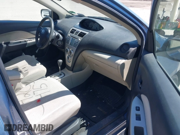 2007 Toyota Yaris with VIN JTDBT923271150207, listed as a IAAI auction lot 42054757 with 173,984 mi miles. Bid and sale history available at carsss.com. Image 5.