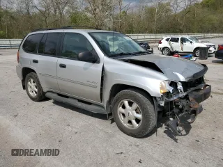 2006 GMC Envoy SLE with VIN 1GKDT13S662223768, listed as a Copart auction lot 55026335 with 149,787 mi miles and Salvage title. Bid and sale history available at DreamBid. Image 4.