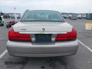 2003 Mercury Grand Marquis LS Premium z VIN 2MEFM75W73X653224, wystawiony jako IAAI lot #42038256 z przebiegiem 145 374 mil mil oraz . Historia ofert i sprzedaży dostępna na DreamBid. Obrazek 16.