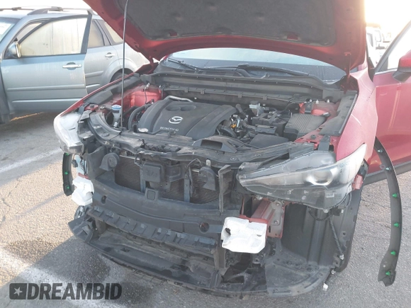 2020 Mazda CX-5 Touring z VIN JM3KFACM1L0855474, wystawiony jako IAAI lot #42004504 z przebiegiem 82 505 mil mil oraz . Historia ofert i sprzedaży dostępna na DreamBid. Obrazek 6.