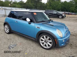 2003 MINI Hardtop S with VIN WMWRE33483TD64131, listed as a Copart auction lot 57428065 with 138,384 mi miles and Clean Title. Bid and sale history available at DreamBid. Image 4.
