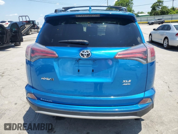 2016 Toyota RAV4 XLE with VIN JTMRFREV2GJ058808, listed as a Copart auction lot 61449135 with 73,985 mi miles and Salvage title. Bid and sale history available at DreamBid. Image 6.