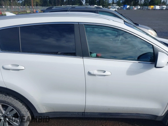 2017 Kia Sportage LX with VIN KNDPMCACXH7160726, listed as a IAAI auction lot 41974303 with 134,772 mi miles and . Bid and sale history available at DreamBid. Image 13.