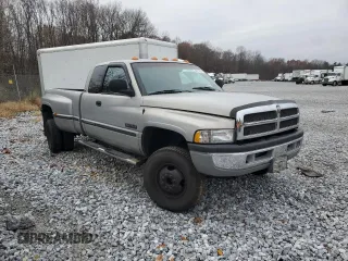 1999 Dodge Ram 3500 with VIN 1B7MF3367XJ532982, listed as a Copart auction lot 80273904 with 216,656 mi miles and Salvage Title. Bid and sale history available at carsss.com. Image 4.