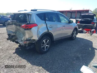 2018 Toyota RAV4 XLE with VIN JTMWFREV9JJ203353, listed as a IAAI auction lot 42129995 with 41,806 mi miles and . Bid and sale history available at DreamBid. Image 4.