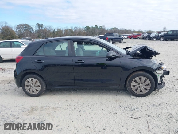 2018 Kia Rio LX with VIN 3KPA25AB6JE050180, listed as a IAAI auction lot 41183808 with 69,330 mi miles and . Bid and sale history available at DreamBid. Image 13.