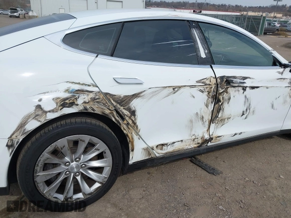 2016 Tesla Model S 70 kWh Battery with VIN 5YJSA1E15GF135841, listed as a IAAI auction lot 41846535 with 87,312 mi miles. Bid and sale history available at carsss.com. Image 6.