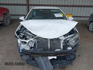2016 Toyota Corolla L with VIN 2T1BURHE0GC703390, listed as a IAAI auction lot 42266907 with 114,983 mi miles and . Bid and sale history available at DreamBid. Image 12.