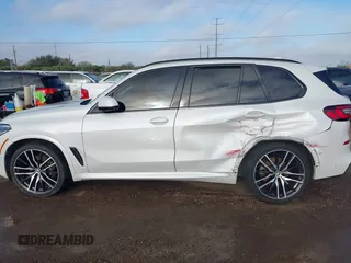 2021 BMW X5 sDrive40i with VIN 5UXCR4C00M9D80482, listed as a IAAI auction lot 41636009 with 85,103 mi miles. Bid and sale history available at carsss.com. Image 14.