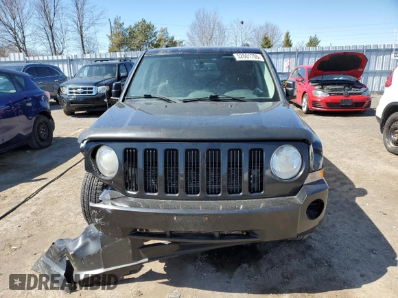 2010 Jeep Patriot Sport with VIN 1J4NF2GB6AD622212, listed as a Copart auction lot 52601705 with 218,001 mi miles and Clean Title. Bid and sale history available at carsss.com. Image 5.