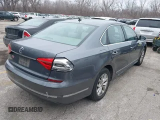 2016 Volkswagen Passat S z VIN 1VWAS7A31GC052520, wystawiony jako IAAI lot #41547408 z przebiegiem 129 730 mil mil oraz . Historia ofert i sprzedaży dostępna na DreamBid. Obrazek 4.