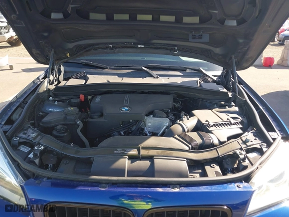 2015 BMW X1 xDrive28i with VIN WBAVL1C56FVY32753, listed as a IAAI auction lot 41759454 with 130,823 mi miles. Bid and sale history available at carsss.com. Image 10.