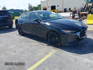 2024 Mazda 3 S Select Sport z VIN 3MZBPABM3RM428730, wystawiony jako IAAI lot #42812223 z przebiegiem 23 463 mil mil oraz . Historia ofert i sprzedaży dostępna na DreamBid. Obrazek 1.