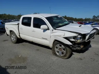 2010 Toyota Tacoma PreRunner with VIN 5TEJU4GN9AZ691581, listed as a Copart auction lot 50878855 with 236,777 mi miles and Salvage Title. Bid and sale history available at DreamBid. Image 4.