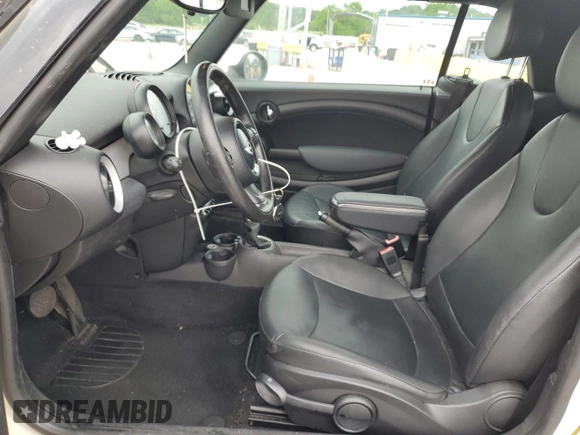 2012 MINI Convertible with VIN WMWZN3C57CT134585, listed as a Copart auction lot 55468995 with 145,645 mi miles and Clean title. Bid and sale history available at DreamBid. Image 7.