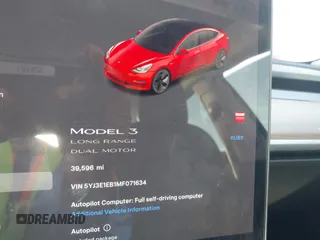 2021 Tesla Model 3 Long Range with VIN 5YJ3E1EB1MF071634, listed as a IAAI auction lot 41964321 with 39,596 mi miles. Bid and sale history available at carsss.com. Image 7.
