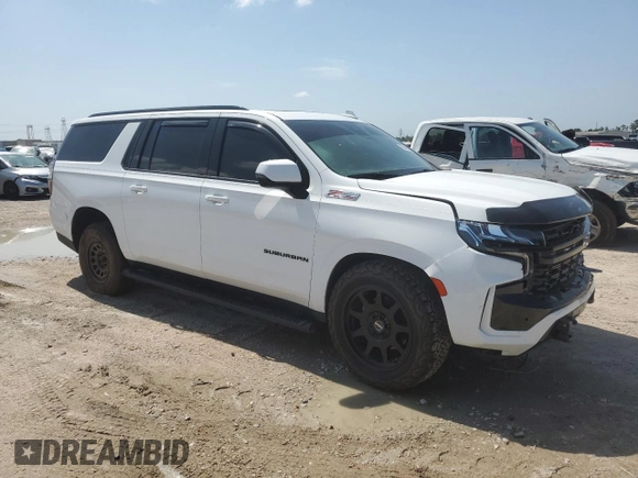 2023 Chevrolet Suburban with VIN 1GNSKDKL5PR286474, listed as a Copart auction lot 55678915 with 96,049 mi miles and Salvage title. Bid and sale history available at DreamBid. Image 4.