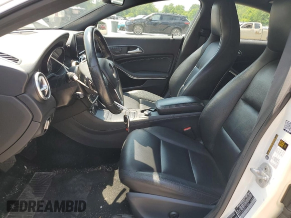 2014 Mercedes-Benz CLA 250 with VIN WDDSJ4GBXEN104886, listed as a Copart auction lot 60210115 with 219,043 mi miles and Salvage title. Bid and sale history available at DreamBid. Image 7.