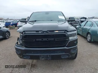 2019 Ram 1500 Big Horn z VIN 1C6RREFT4KN769609, wystawiony jako IAAI lot #42401229 z przebiegiem 46 049 mil mil oraz . Historia ofert i sprzedaży dostępna na DreamBid. Obrazek 13.