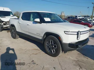 2024 Rivian R1T Adventure with VIN 7FCTGBAA8RN031244, listed as a IAAI auction lot 41685426 with 167 mi miles. Bid and sale history available at carsss.com. Image 1.