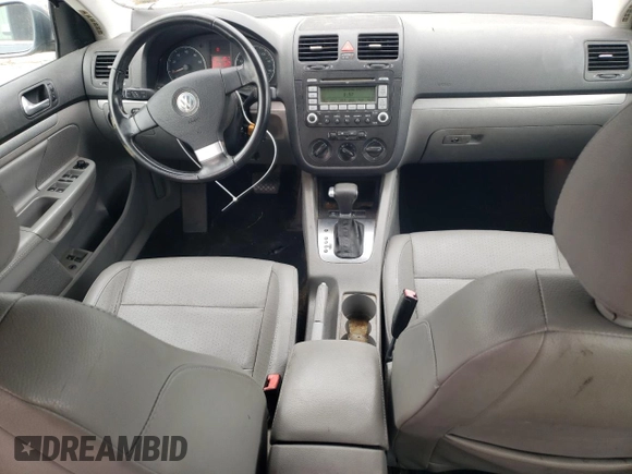 2008 Volkswagen Jetta SE with VIN 3VWRM71K08M037186, listed as a Copart auction lot 60173795 with 186,594 mi miles and Salvage title. Bid and sale history available at DreamBid. Image 8.
