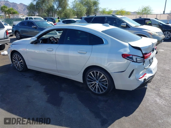2023 BMW 2 Series 228i with VIN WBA53AK00P7M12823, listed as a IAAI auction lot 42093921 with 24,577 mi miles. Bid and sale history available at carsss.com. Image 3.