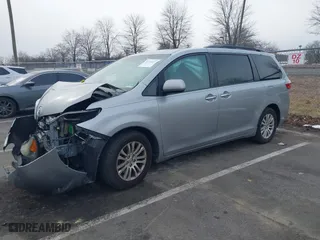 2016 Toyota Sienna XLE with VIN 5TDYK3DC3GS708043, listed as a IAAI auction lot 41349237 with 126,226 mi miles. Bid and sale history available at carsss.com. Image 17.