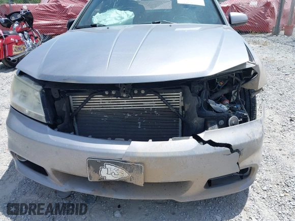 2013 Dodge Avenger SXT with VIN 1C3CDZCGXDN741008, listed as a IAAI auction lot 42086508 with 124,596 mi miles and . Bid and sale history available at carsss.com. Image 6.