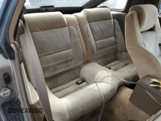 1986 Toyota Supra z VIN JT2MA70L3G0009411, wystawiony jako Copart lot #87545755 z przebiegiem 151 108 mil mil oraz Czysty tytuł • Clean title. Historia ofert i sprzedaży dostępna na DreamBid. Obrazek 10.