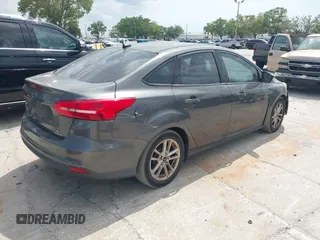 2016 Ford Focus SE with VIN 1FADP3F27GL264452, listed as a IAAI auction lot 41842240 with 180,261 mi miles. Bid and sale history available at carsss.com. Image 4.