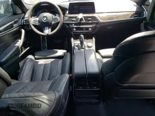 2018 BMW 5 Series 530e with VIN WBAJA9C55JG623181, listed as a Copart auction lot 61593983 with 63,577 mi miles and . Bid and sale history available at DreamBid. Image 8.