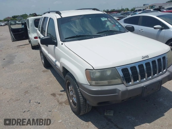 2003 Jeep Grand Cherokee Laredo with VIN 1J4GX48S63C546208, listed as a IAAI auction lot 42288811 with 141,696 mi miles and . Bid and sale history available at DreamBid. Image 1.