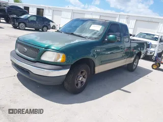 2000 Ford F-150 XL with VIN 1FTZX1729YNB93649, listed as a IAAI auction lot 42069599 with 1 mi miles. Bid and sale history available at carsss.com. Image 17.