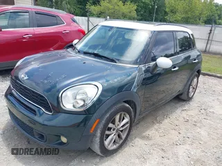 2013 MINI Countryman S z VIN WMWZC3C52DWP20729, wystawiony jako IAAI lot #42388184 z przebiegiem 165 283 mil mil oraz . Historia ofert i sprzedaży dostępna na DreamBid. Obrazek 2.