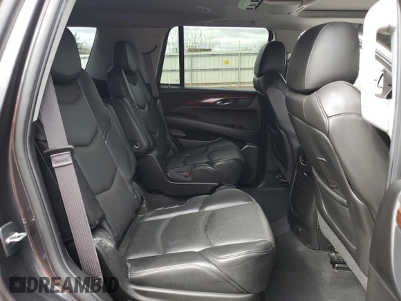2015 Cadillac Escalade Luxury z VIN 1GYS4BKJXFR238094, wystawiony jako Copart lot #53188355 z przebiegiem Nie podano mil oraz Szkody całkowita. Historia ofert i sprzedaży dostępna na DreamBid. Obrazek 12.