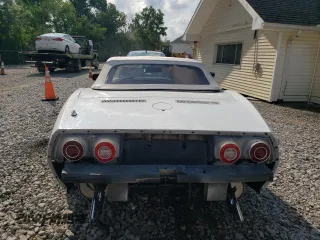 1974 Chevrolet Corvette with VIN 1Z67J4S405054, listed as a Copart auction lot 66356575 with 7,810 mi miles and Salvage title. Bid and sale history available at DreamBid. Image 6.