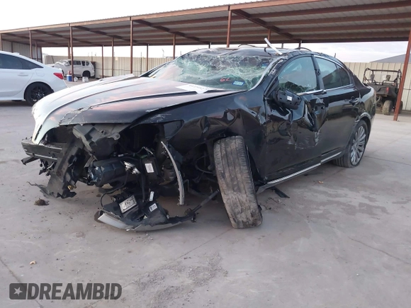 2014 Lincoln MKS with VIN 1LNHL9DK6EG609386, listed as a IAAI auction lot 41195270 with 144,395 mi miles and . Bid and sale history available at DreamBid. Image 2.