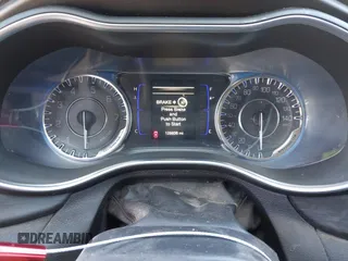 2016 Chrysler 200 Limited with VIN 1C3CCCAB3GN184650, listed as a IAAI auction lot 40963499 with 128,836 mi miles and . Bid and sale history available at DreamBid. Image 7.