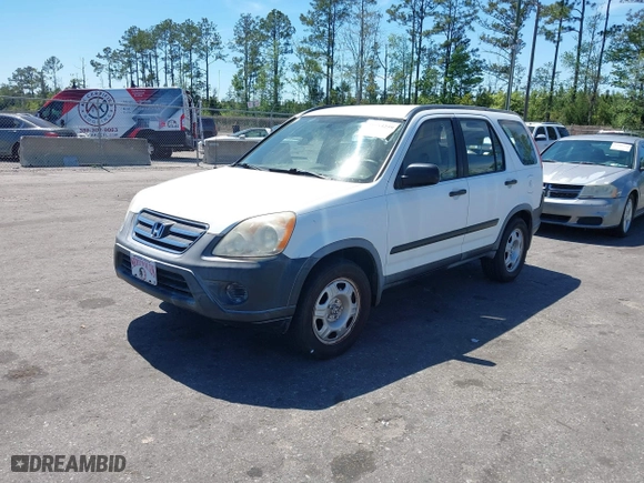 2006 Honda CR-V LX with VIN JHLRD68546C026819, listed as a IAAI auction lot 41883259 with 136,150 mi miles. Bid and sale history available at carsss.com. Image 2.