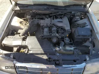 1996 Toyota Crown z VIN JZS1550042389, wystawiony jako Copart lot #68698234 z przebiegiem 117 283 mil mil oraz Szkoda całkowita • Salvage title. Historia ofert i sprzedaży dostępna na DreamBid. Obrazek 11.