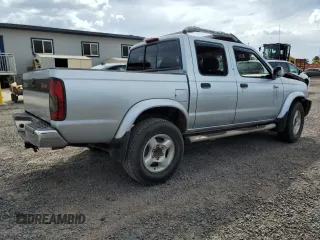 2000 Nissan Frontier XE with VIN 1N6ED27T8YC367452, listed as a Copart auction lot 55866345 with 242,945 mi miles and Salvage title. Bid and sale history available at DreamBid. Image 3.