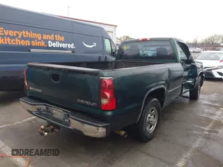 2004 Chevrolet Silverado 1500 LS with VIN 1GCEC14T04Z302610, listed as a IAAI auction lot 41292673 with 135,178 mi miles. Bid and sale history available at carsss.com. Image 4.