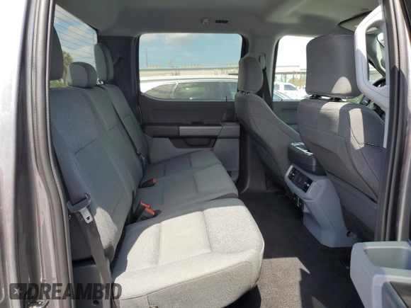 2024 Ford F-150 Lightning XLT with VIN 1FTVW3LK8RWG23783, listed as a Copart auction lot 58359625 with 5,864 mi miles and Salvage title. Bid and sale history available at DreamBid. Image 10.