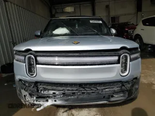 2025 Rivian R1S Adventure with VIN 7PDSGBBA4SN049237, listed as a Copart auction lot 53455505 with 0 mi miles and Salvage Title. Bid and sale history available at carsss.com. Image 5.