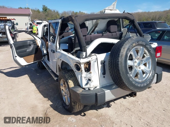 2013 Jeep Wrangler Unlimited Moab with VIN 1C4HJWEG7DL569862, listed as a IAAI auction lot 42095535 with Not provided miles and . Bid and sale history available at DreamBid. Image 3.