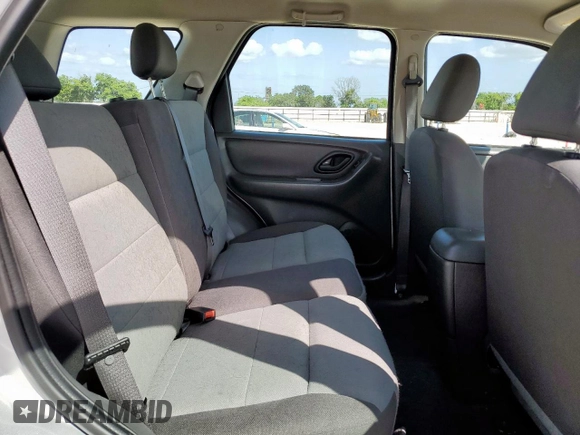 2007 Ford Escape XLS with VIN 1FMYU02Z87KB60530, listed as a Copart auction lot 61273345 with 57,574 mi miles and Salvage title. Bid and sale history available at DreamBid. Image 11.