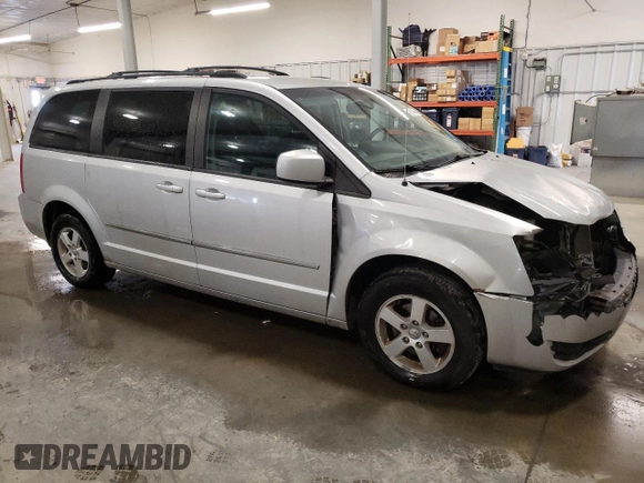 2010 Dodge Grand Caravan SXT with VIN 2D4RN5D19AR409665, listed as a Copart auction lot 46676445 with 174,063 mi miles and Salvage Title. Bid and sale history available at DreamBid. Image 4.