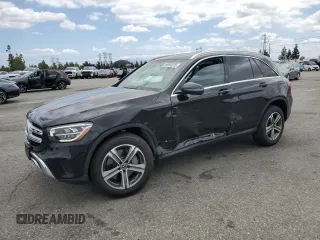 2020 Mercedes-Benz GLC 300 with VIN W1N0G8DBXLF771971, listed as a Copart auction lot 56992325 with 77,251 mi miles and Salvage title. Bid and sale history available at DreamBid. Image 1.